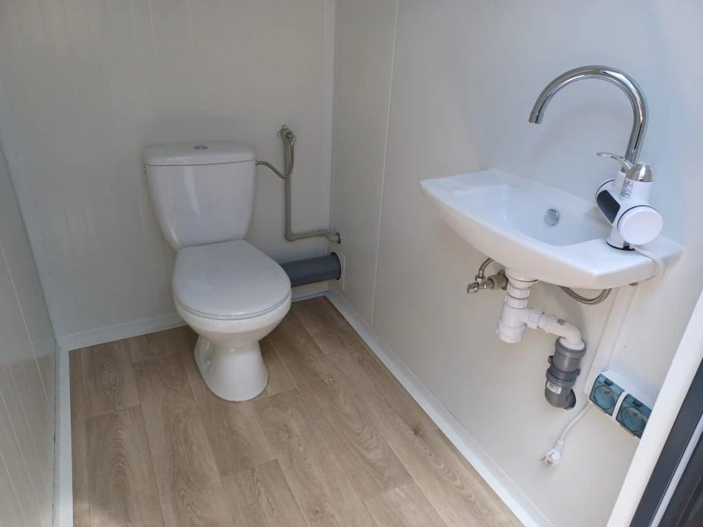 Contenedor sanitario doble de 2 cabinas
